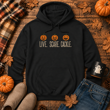 Load image into Gallery viewer, Live Scare Cackle Pumpkin Hoodie