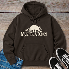 Load image into Gallery viewer, Must Be a Demon Raccoon Hoodie
