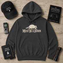 Load image into Gallery viewer, Must Be a Demon Raccoon Hoodie
