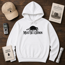 Load image into Gallery viewer, Must Be a Demon Raccoon Hoodie
