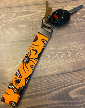 Load image into Gallery viewer, Halloween Witch &amp; Spider Floral Keychain Wristlet
